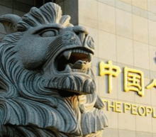 中国人民银行大幅上调人民币中间价，以警告空头